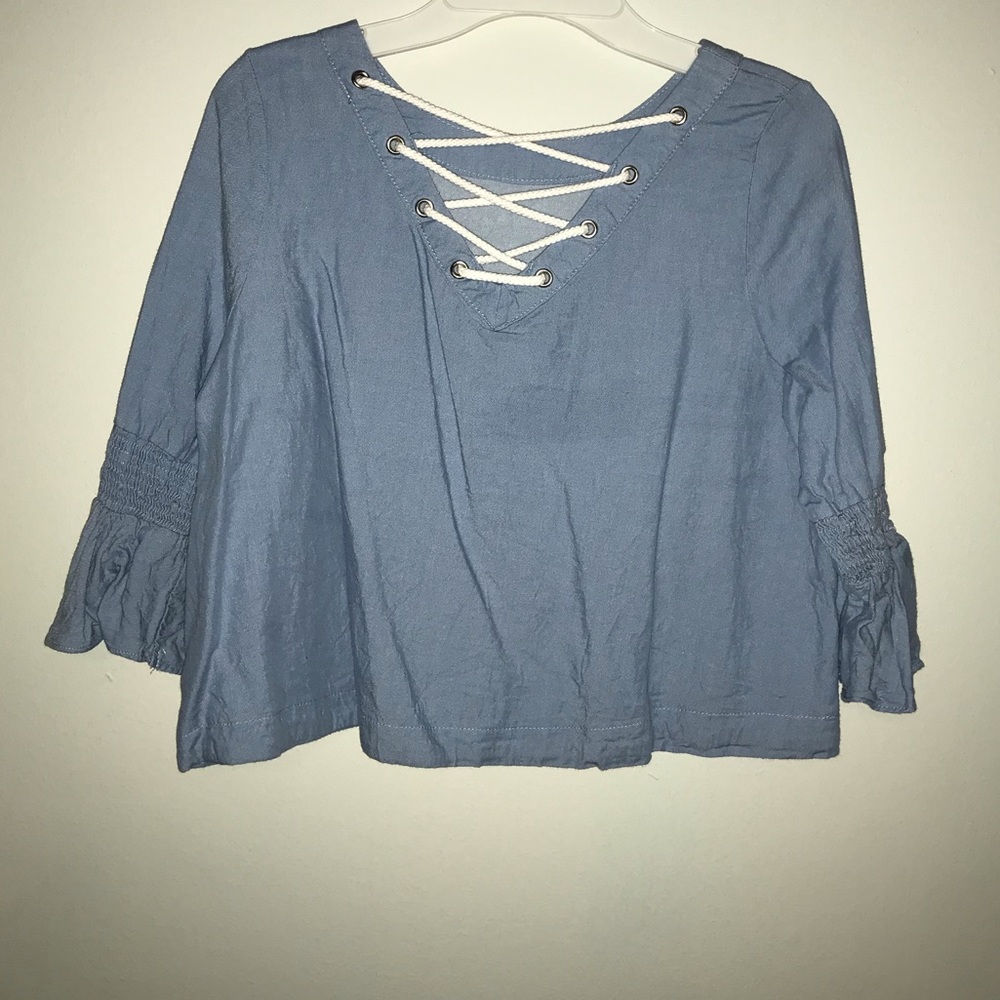 Girls cropped shirt , light blue size Large